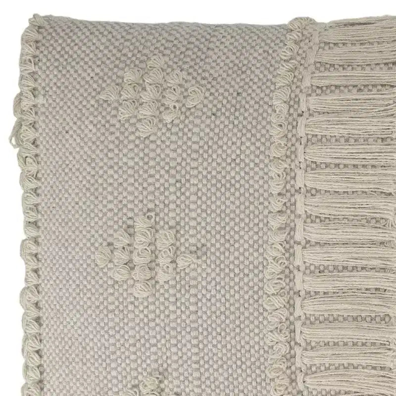 Banc rembourré à rayures et pois abstraits